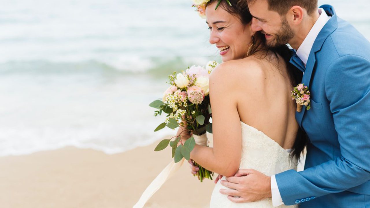 Couple getting married on the beach